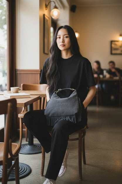 Borsa con frange in pelle scamosciata